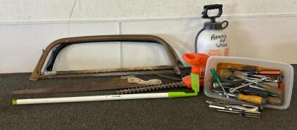 2 Bow Saws, A Hoe, Saw, Black And Decker Electric Hedge Trimmer (Unable To Test), Screw Drivers And More