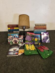 Gardening and antique books Including flower seeds and little women and gone with the wind