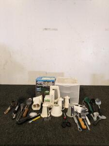 Assorted kitchen utensils and a salad shooter