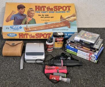 Hit The Spot Vintage Board Game, (2) PlayStation Games, (2) PC Games, Nintendo DS Game, DVDs Learn In 15Min (French & Italian), Binoculars, Polaroid Camera (Unable to Test), Daisy BBs, Copperhead BBs, Assortment Of Duck Calls