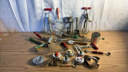Assorted Antique/Vintage Kitchen Utensils , Meat Grinder, Beater/Mixers , Chopper , Cookie Cutters and more