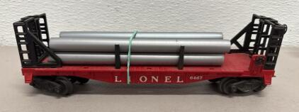 1956 Lionel 6467 O Scale Flat Car with Metal Pipe Load, Red/Black