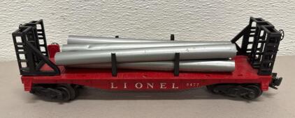 1957-1958 Lionel 6477 O Scale Flatcar with Pipe Load, Red