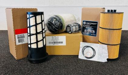 Premium Filtration Components: Detroit Oil Filter Kit, Fleetguard Air Filter (AF4219), and a Filter Insert Kit