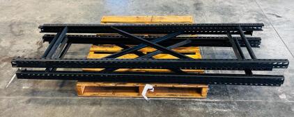 Components To A Heavy Duty Industrial Shelving Unit, Specifically The Uprights and Cross Bracing That Form The Frame Of The Rack.
