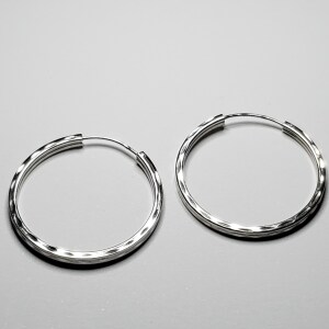 $160 Silver Medium Size Hoop Earrings