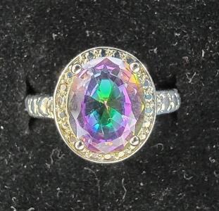 (1) Titanium And Gold Wedding Band (1) Mystic Topaz Ring (1) Michael Dreschler Amethyst Ring