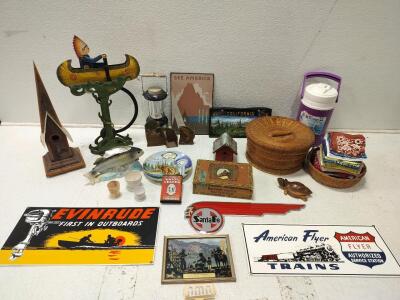 Vintage kinetic sculpture of Native American in Canoe, yellow stone plate and much more assorted decor