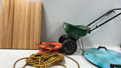 Spreader,assorted cord extensions unknown length ,cutting board