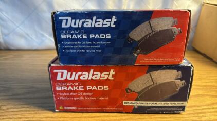 (1) Front Duralast Brake Pads (1) Duralast Rear Brake Pads. Both Are New In Box