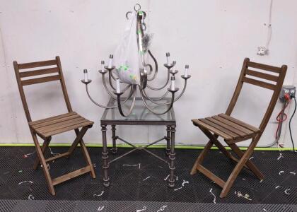 (1) 20"x 20"x 20&frac12;" Vintage Giacometti Style Wrought Iron Side Table With Thick Glass Top, (2) Foldable Wooden Picnic Chairs, & (1) 9-Candle-Nickel Chandelier
