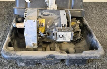 Alternator, Likely from a Vehicle or a Generator, with a Voltage Regulator Attached, With Case.