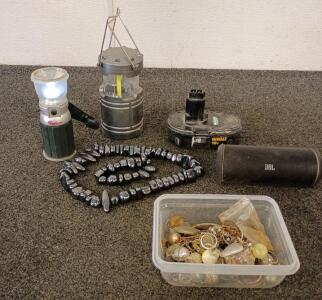 (2) Camping Lights. Black Magnetic rocks. DeWalt 18v Battery. JBL Portable Bluetooth Speaker and Much Much More