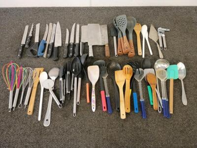 Lot of Kitchenware and Kitchen Knives and (1) Glass Baking Dish W/Glass Lid. (3) Large Glass Serving Dishes. (1) Large Glass Serving Pitcher. (5) Pint Glasses and Much More