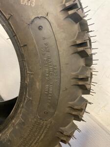 (2) Carlisle 25x10.00-12 NHS Tires, With 5 Gallon Arctic Blue Hydraulic Oil And, (2) Jugs 1 Gallon Transaxle Fluid