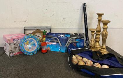 Miscellaneous Lot Including Candle Pedestals, Spinal Traction Device, Electric Breast Pump, Clocks, Baseballs, Black Light And More