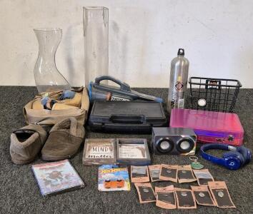 Black & Decker Vacuum(Unable to Test), Sigarms Padded Case, (2) Vases, Home Decor, Make Pallet Box, Water Bottle, Mini Speaker Box(Unable to Test), Headphones, Slippers(Size 11), Women's Shoes(Size 19), Hot Wheels, DVD(Spiderman), Key Chain, (10) Hand Cra