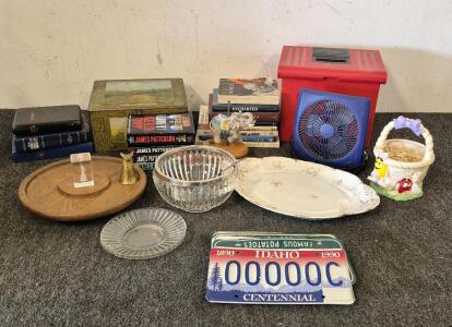 (4) James Patterson Books( The Cheff, The Inn, The Coast to Coast Murders, The 19th Christmas), (3)Bibles, (8) Other Books( Uncharted, The Ilaid of Homer, Dark Money, Shade, Interior decorator, Bicycle Maintenance and Repair), File Box, Tin Box, License