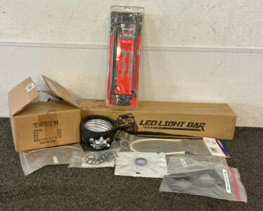 (1) Quans 30W LED Flood Light, (1) Nilight LED Light Bar, (1) Allen Metal Tool And Gun Rack, And More