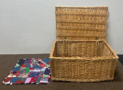 (1) 17&rdquo;x 17&rdquo; quilt (1) Basket