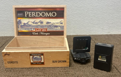 (1) Dash Cam (1) Street Wise Taser (1) Perdomo Box