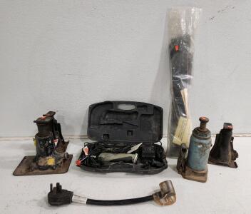 (4) Assorted Truck Jacks (1) Electric Fillet Knife (1) Surge Protector And More
