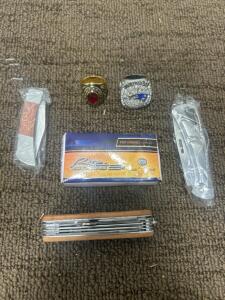 (3) Pocket knives (1)Tool knife (1) New England Patriots SUper Bowl Ring