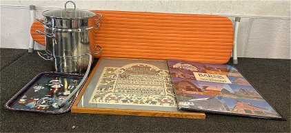(1) Ironing Board, (1) Cooks Standard Canning Juice Extractor, And Cross Stitched Picture Framed(25 Inches X 22 3/8 Inches), And More