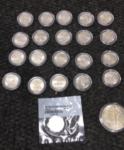 (21) USA State Quarters and (1) 2016 Liberty Silver Dollar