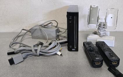 Nintendo Wii, (2) Controllers, Motion Bar, Power And A/V Cables, Charge Stand For Controller Batteries