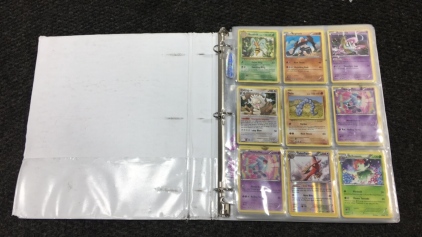 Binder with (19) Pages of Collectible Pokémon