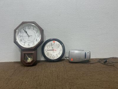 (2) Westclox Clocks (1) Emerson AM/FM Portable Radio.
