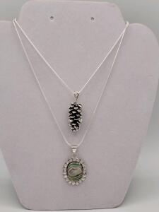 (1) Tibetan Silver (.925) Wrapped Abalone Shell Necklace (1) Tibetan Silver (.925) Pinecone Necklace. Both on 24" chains