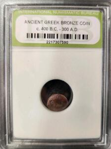 (1) Ancient Greek Bronze Coin Circa 400B.C. - 300 A.D