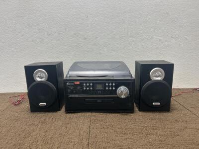 (1) Jensen Turn table with built in CD player and radio. two 9&rdquo;x6&rdquo; Jensen speakers