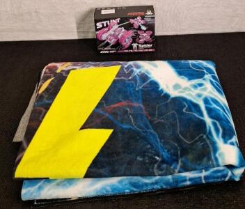 (1) Spider, RC Stunt Car, (1) 5 x 8 Foot Area Rug & (1) Box Of Assorted Amazon Overstock
