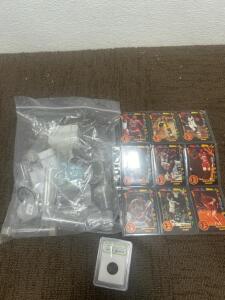 (9) Wild card basketball cards (1) Space rock (1) Bag of Coin Holders