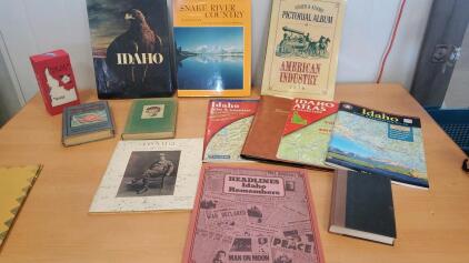Assorted Books And Vintage Maps