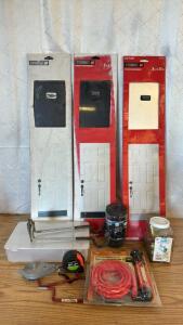 Assorted Items (3) Door Kick Plates 1 Satin Aluminum 2 anodized Bronze Finish (1) Multi Use Transfer Pump (1) Container Of 3/4&rdquo; Conduit Couplers (1) Container Or Tarp Straps (1) IKEA Clear Organizer & More
