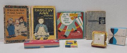 (1) Raggedy Ann and Andy and the Camel with the Wrinkled Knees, copyright 1924 by Johnny Gruelle (1) Raggedy Ann Stories, missing pages by Johnny Gruelle (1) Little Actobat Toy (1) Westclox Keywound Travel Alarm Clock w/Original Box (1) Tom Swift and His 