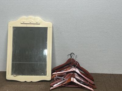 (14) Wooden hangers (1) 19&rdquo;x28&rdquo; mirror.