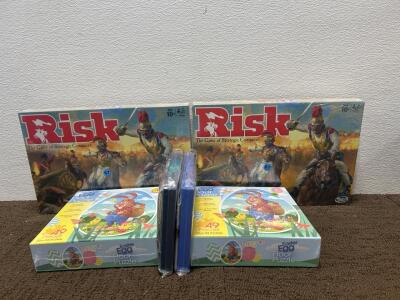 (2) Risk The Game of Strategic Conquest (2) Easter egg Floor Puzzles (2) Treasure K-pop Stickers and Photo cards.