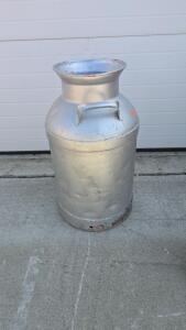 A 24Cm H Milk Churn and 40Pound Dumbbell