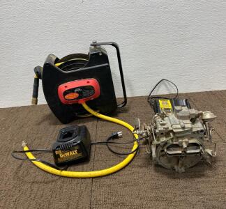 (1) Central Pneumatic Air hose Reel. (2) Dewalt tool battery charger (1) Carburetor.