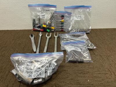 (2) Bags of Nut drivers (2) Pickle forks (1) Bag of assorted Wrenches and more