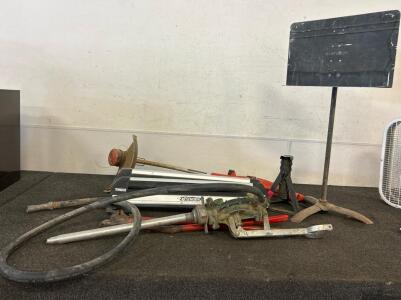 (1) Vacuum Hand Pump, (2) Wheel Holdetrs, (1) Black And Decker Electric String Trimmer, And More