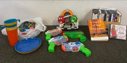 Workout DVDs, Travel Book, (4) Water Guns, M&M Dispenser, Pet Leashes, Plastic Kid Dishes
