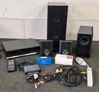 Magnavox VHS Player With Remote(Works), Genesis Speaker Set, Vizio Wireless Subwoofer, Surge Protector, Cables, US Adapters, Pack Of Watch Batteries