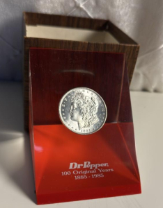 Dr. Pepper 100 Original Years Commemorative 1885 Morgan Silver Dollar Paperweight