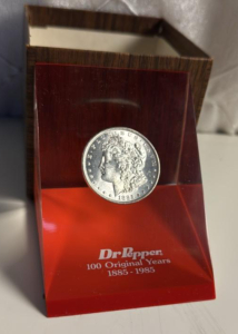 Dr. Pepper 100 Original Years Commemorative 1885 Morgan Silver Dollar Paperweight